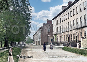This is a beautifully restored early 1900's image of Charlemont Place, situated on The Mall, Armagh. The image shows five young people pose for the cameraman with two pushing bicycles.